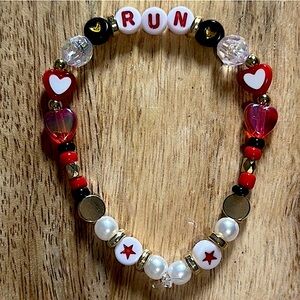 5 for $10 Taylor Swift Handmade Friendship Beaded Bracelet
“Run”